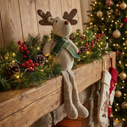 Reno sentado con bufanda